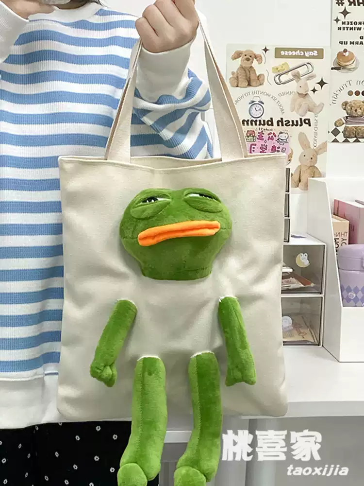Ugly and cute sad frog canvas bag women's cute funny frog doll commuter bag large capacity tote bag shoulder bag cute