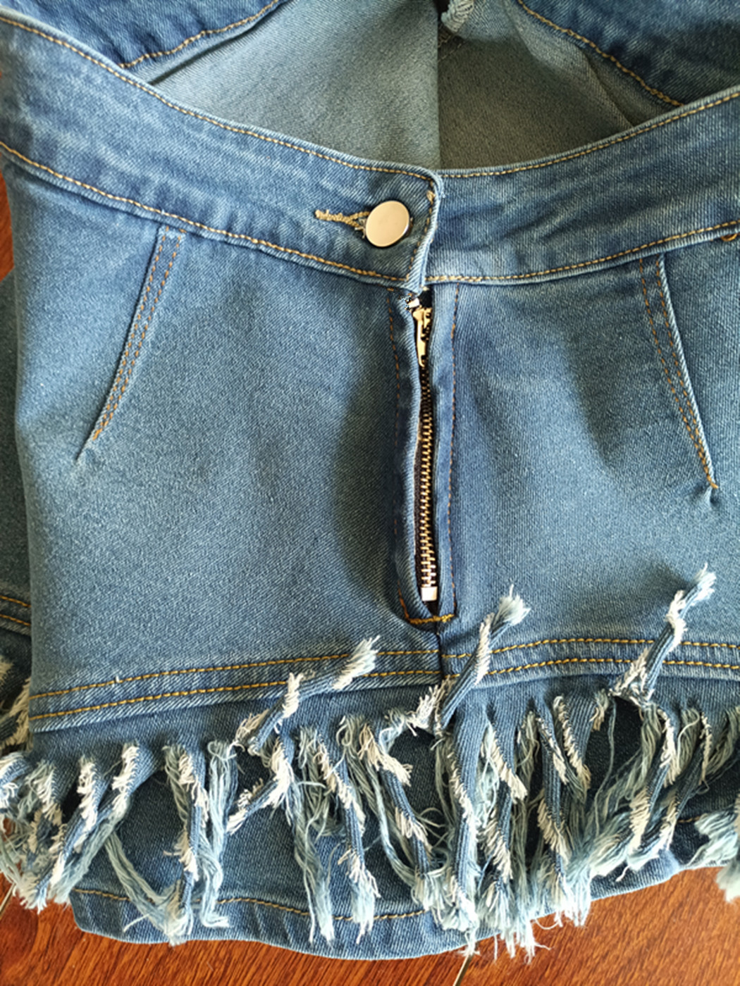 Women Denim Stretch Diagonal Apron Fringed Shorts