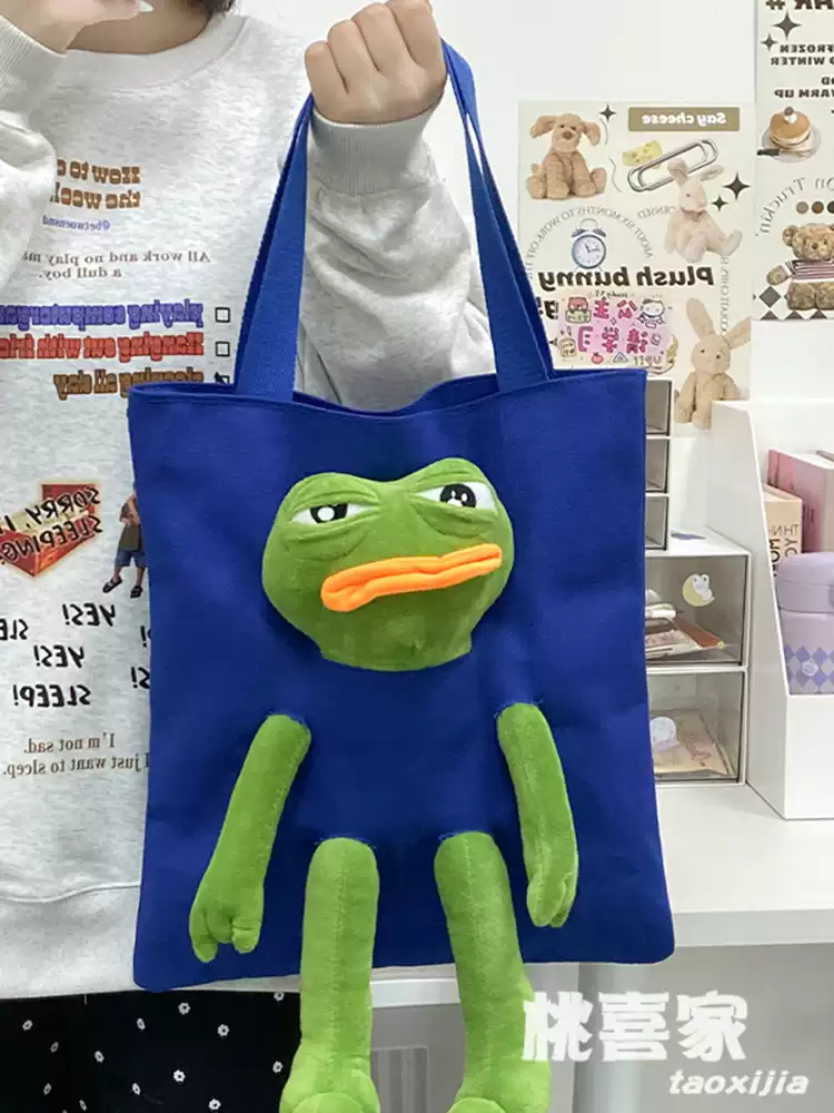Ugly and cute sad frog canvas bag women's cute funny frog doll commuter bag large capacity tote bag shoulder bag cute