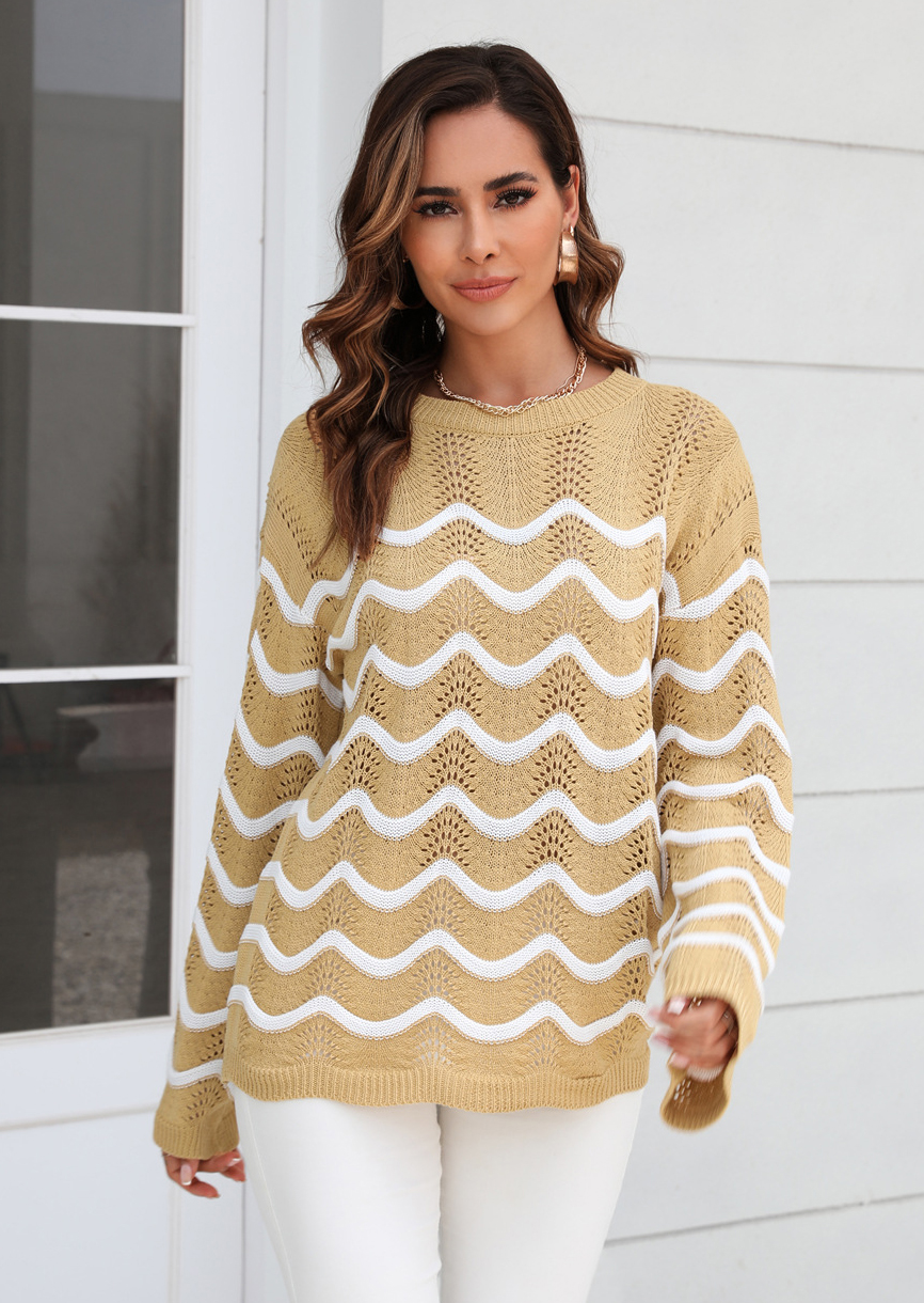 Women knitting long sleeve striped cutout sweater