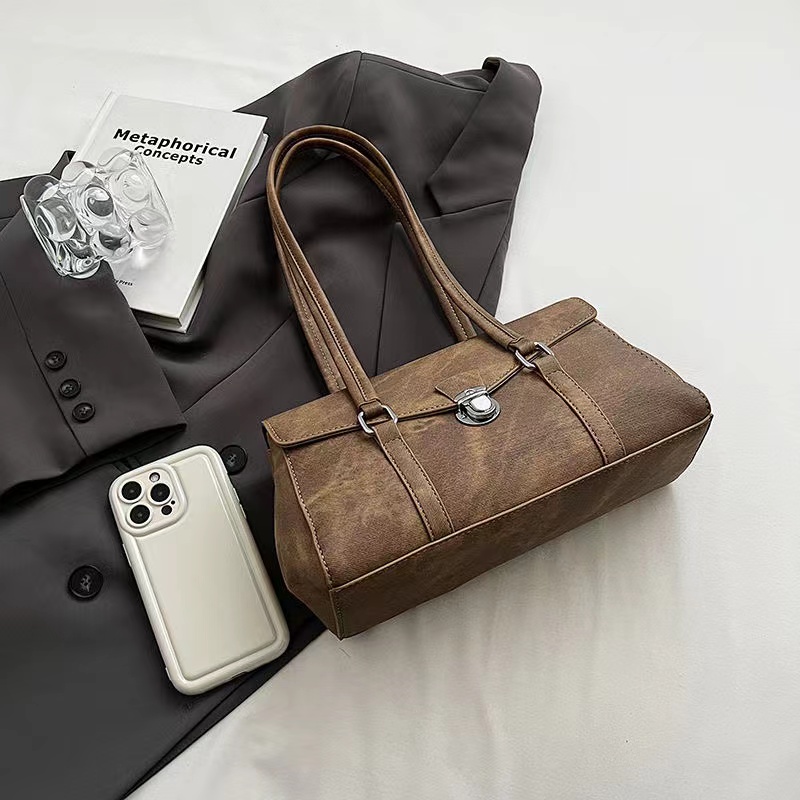 French niche light luxury bag for women 2023 new dual-use high-end shoulder bag retro versatile underarm baguette bag