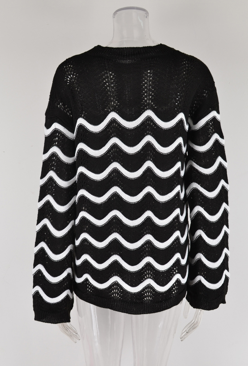 Women knitting long sleeve striped cutout sweater