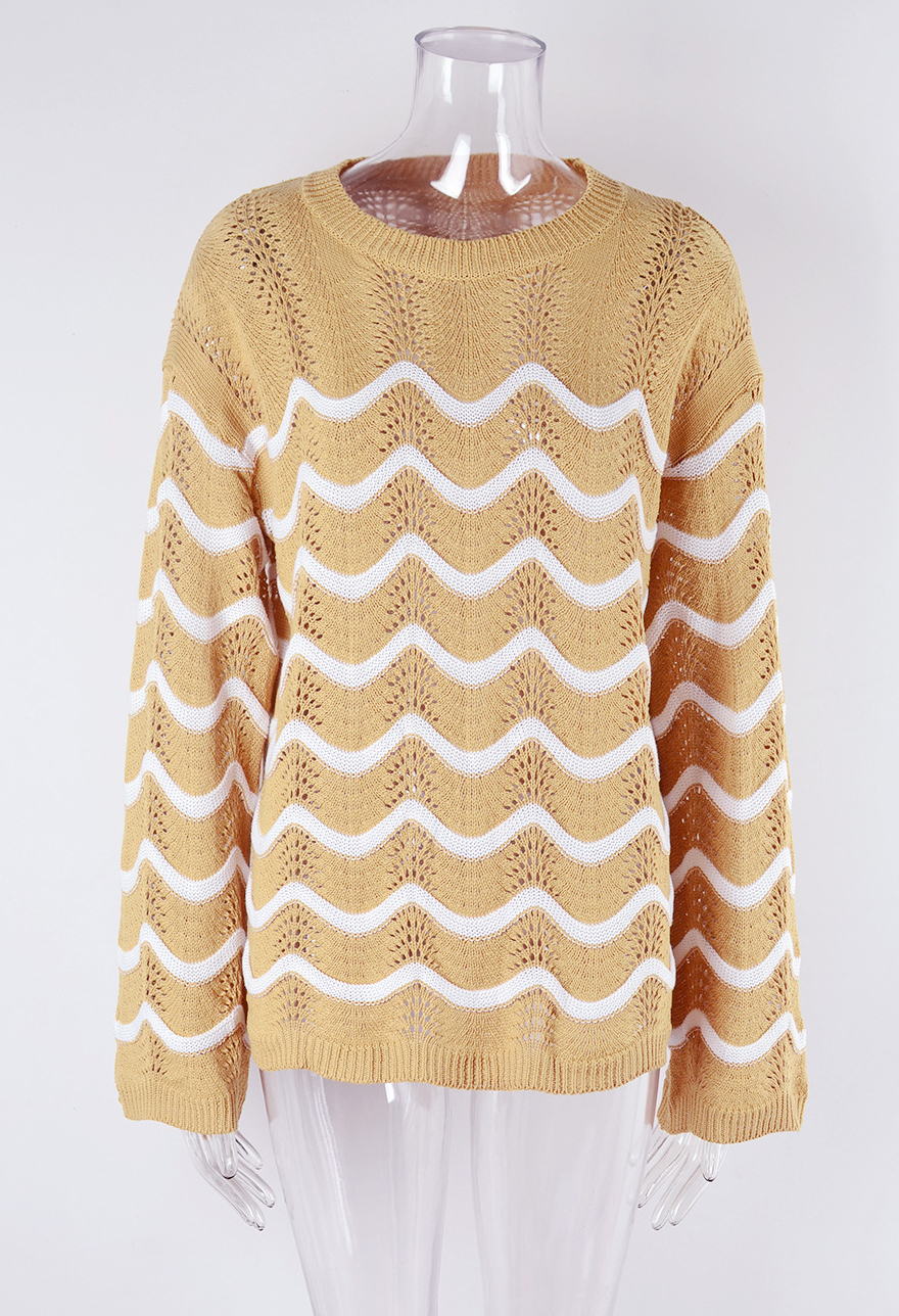 Women knitting long sleeve striped cutout sweater